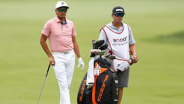 DETROIT, MICHIGAN - JUNE 26: Rickie Fowler of the United States stands with his caddie on the fourth hole during a practice round prior to the Rocket Mortgage Classic at Detroit Golf Club on June 26, 2024 in Detroit, Michigan.   Raj Mehta/Getty Images/AFP (Photo by Raj Mehta / GETTY IMAGES NORTH AMERICA / Getty Images via AFP)